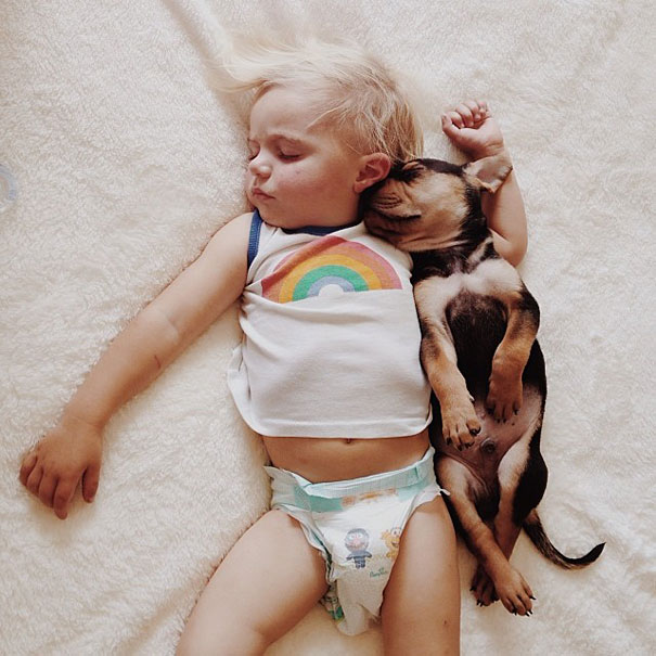 lovely-funny-cute-pictures-toddler-sleeping-with-puppy-dog (10)
