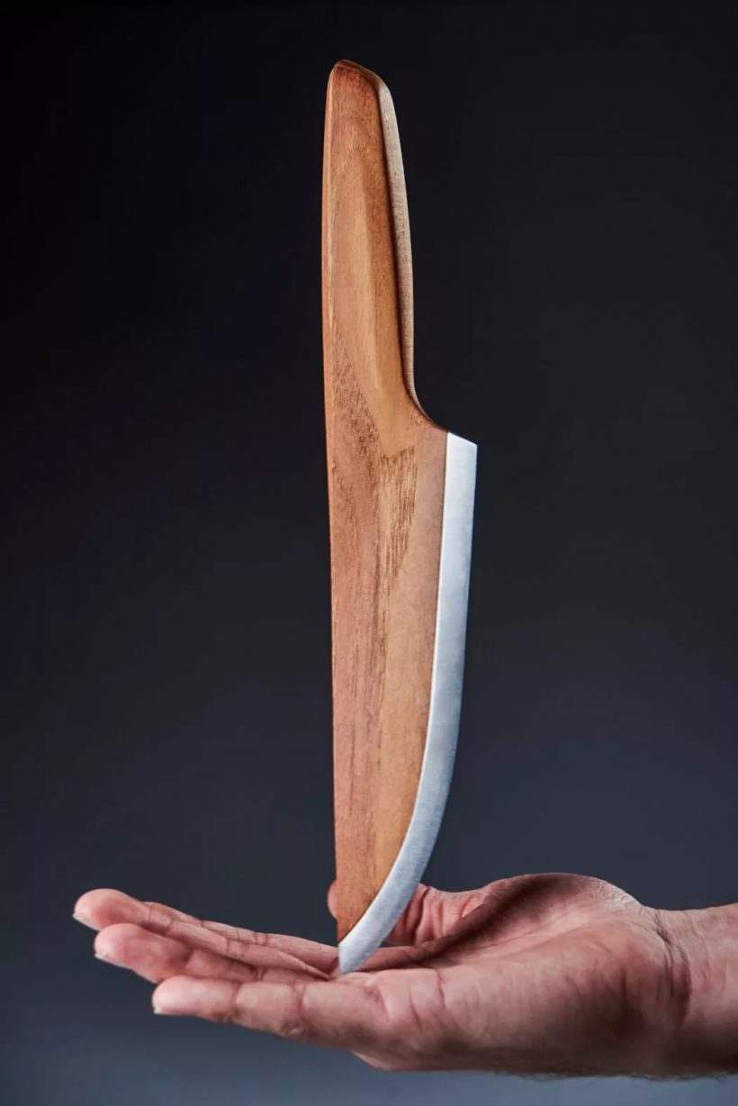 Beautiful chef knife crafted in wood and a very thin steel edge